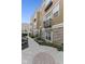 Beautiful exterior with stone accents, a small balcony, and a well-maintained walkway at 6665 Boxcar Pl, Indianapolis, IN 46220