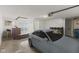Spacious garage features car, shelving, storage, and potential home bar or workstation at 6665 Boxcar Pl, Indianapolis, IN 46220