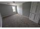 Bedroom featuring neutral walls and carpeted flooring at 689 N Main St, Martinsville, IN 46151