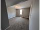Bedroom featuring neutral walls and carpeted flooring at 689 N Main St, Martinsville, IN 46151