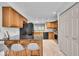 Spacious kitchen with a breakfast bar, stainless steel appliances, and plenty of storage space at 6916 Ralph Ct, Indianapolis, IN 46220