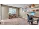 Functional home office space with natural light and comfortable seating at 6916 Ralph Ct, Indianapolis, IN 46220