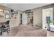 Another view of the office showing more decor and entry to the Primary bathroom at 6916 Ralph Ct, Indianapolis, IN 46220