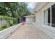 Back patio features modern screening, privacy, and space for outdoor seating at 7277 N College Ave, Indianapolis, IN 46240