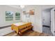 Cozy breakfast nook with bright windows, wainscoting detail, and a stylish table at 7277 N College Ave, Indianapolis, IN 46240