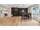 Stylish dining room with fireplace, hardwood floors, and dining table at 7277 N College Ave, Indianapolis, IN 46240