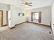Bright bedroom with a neutral palette and large window providing natural light at 734 W North St, Lebanon, IN 46052