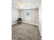 Bright, cozy bedroom featuring neutral walls and soft carpeting at 734 W North St, Lebanon, IN 46052
