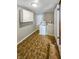 Practical laundry room with washer, dryer, cabinet and tiled floor at 734 W North St, Lebanon, IN 46052