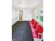 Room featuring a row of bright red chairs, light walls, and natural light at 734 W North St, Lebanon, IN 46052