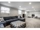 Finished basement with carpet, fireplace and comfortable seating at 7531 Mohawk Ln, Indianapolis, IN 46260