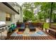 Outdoor deck area features lounge chairs, grill and play area at 7531 Mohawk Ln, Indianapolis, IN 46260