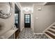 Welcoming foyer with a decorative tile floor, leading to the rest of the home at 7531 Mohawk Ln, Indianapolis, IN 46260