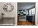 Elegant living room featuring hardwood floors, modern furnishings, and bright natural light at 7531 Mohawk Ln, Indianapolis, IN 46260