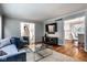Spacious living room with hardwood floors and modern decor at 7531 Mohawk Ln, Indianapolis, IN 46260