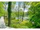Lush backyard with lake access and scenic views at 7753 Ivy Dr, Nineveh, IN 46164