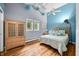 Cozy bedroom with a sloped ceiling, ample natural light, and hardwood flooring at 7753 Ivy Dr, Nineveh, IN 46164