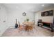 Home features a cozy dining room with wood accents, a dart board, and musical instrument at 7753 Ivy Dr, Nineveh, IN 46164