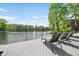 Relaxing dock with comfortable seating and picturesque lake scenery at 7753 Ivy Dr, Nineveh, IN 46164