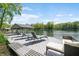 Dock featuring comfortable lounge chairs and stunning lake views at 7753 Ivy Dr, Nineveh, IN 46164