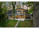 Charming exterior of a two story home with balcony, patio, and hot tub at 7753 Ivy Dr, Nineveh, IN 46164