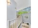 The interior shows a landing between the upper and lower levels in this home at 7753 Ivy Dr, Nineveh, IN 46164