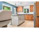 Well-lit kitchen featuring modern appliances, ample counter space, and wood cabinets at 7753 Ivy Dr, Nineveh, IN 46164