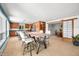 Open-concept kitchen featuring modern appliances, stylish cabinetry, and an island with seating at 7753 Ivy Dr, Nineveh, IN 46164