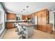 Well-equipped kitchen featuring an island, stainless steel appliances, and light wood cabinets at 7753 Ivy Dr, Nineveh, IN 46164