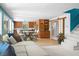 Open-concept living room flowing into the kitchen with modern finishes and plenty of natural light at 7753 Ivy Dr, Nineveh, IN 46164
