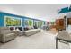 Bright open-concept living room featuring stylish furnishings and views of the outdoors at 7753 Ivy Dr, Nineveh, IN 46164