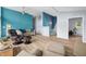 The interior shows a large living room with high ceilings and unique angles at 7753 Ivy Dr, Nineveh, IN 46164