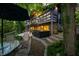 Relaxing outdoor space with table, chairs, and hot tub at 7753 Ivy Dr, Nineveh, IN 46164