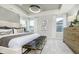 Well-lit main bedroom featuring a cushioned bench, contemporary design, and large windows for ample light at 778 Adler Dr, Avon, IN 46123