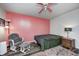 Charming bedroom with soft rug, chair and bassinet near a sunny window at 7835 Quail S Rdg, Plainfield, IN 46168