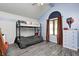 This bedroom has a loft bed, blue paint and plenty of natural light at 7835 Quail S Rdg, Plainfield, IN 46168