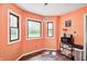 Cozy breakfast nook with warm colors, large windows, and a vintage light fixture at 7835 Quail S Rdg, Plainfield, IN 46168