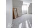 Attic area with natural light and sloped ceilings and modern gray carpeting at 8065 Bayberry Ct, Indianapolis, IN 46250