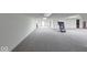 Neutral carpet and bright lights make this spacious basement a blank canvas at 8065 Bayberry Ct, Indianapolis, IN 46250