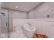Bathroom with a frameless glass shower and a modern soaking tub with designer tile flooring at 8065 Bayberry Ct, Indianapolis, IN 46250