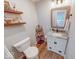 Half bathroom with granite vanity and updated fixtures at 8065 Bayberry Ct, Indianapolis, IN 46250
