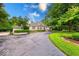 Wide shot of the attractive home showcasing its beautiful landscaping and curb appeal at 8065 Bayberry Ct, Indianapolis, IN 46250
