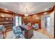 Elegant home office with wood accents, built-in shelves, and a comfortable seating area at 8065 Bayberry Ct, Indianapolis, IN 46250
