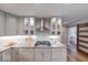 Modern kitchen with stainless steel appliances, granite countertops, and ample cabinetry space at 8065 Bayberry Ct, Indianapolis, IN 46250