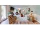 Bright living room with a fireplace, stylish rug, and comfortable seating at 8065 Bayberry Ct, Indianapolis, IN 46250