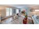 Bright living room featuring a comfortable seating area and hardwood style floors at 8065 Bayberry Ct, Indianapolis, IN 46250