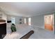 Bright main bedroom features a sitting area, soft carpet, and access to an en-suite bathroom at 8065 Bayberry Ct, Indianapolis, IN 46250