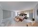 Large main bedroom with a luxurious bed, soft carpet, and plenty of natural light from the windows at 8065 Bayberry Ct, Indianapolis, IN 46250