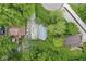 Aerial view of home with long gravel driveway surrounded by manicured lawn and mature trees at 809 Iron Bridge Rd, Cicero, IN 46034