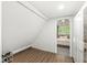 Bedroom showing a queen bed with a walk-in closet with hardwood floors and trim at 809 Iron Bridge Rd, Cicero, IN 46034